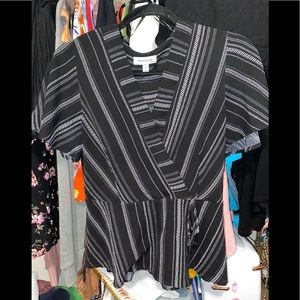 Black and white printed blouse.